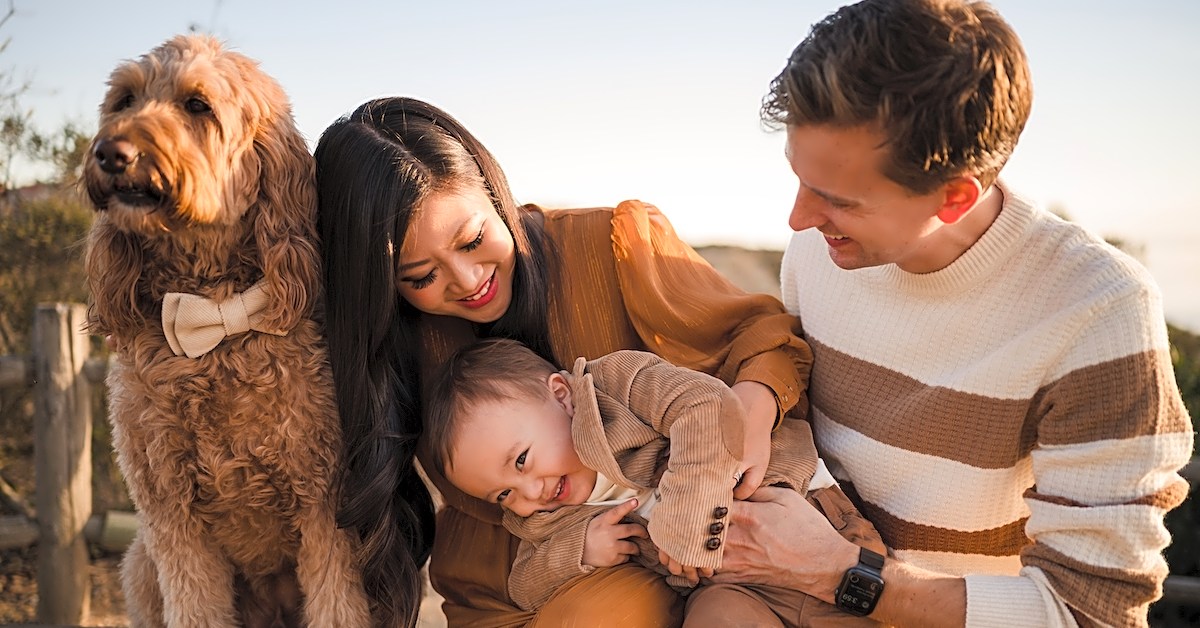 How can you capture candid moments while photographing families?